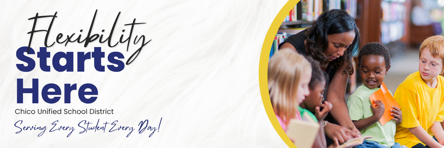 Picture of an adult in a library reading to students