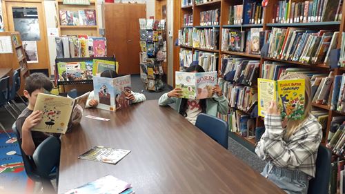 Students reading in the library.